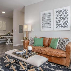 a living room with a couch and coffee table